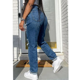 Jean bleu délavé déchiré taille moyenne style hipster